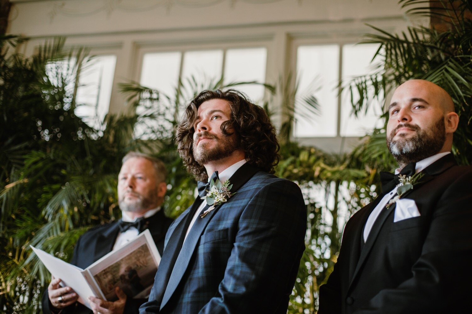  Intimate wedding ceremony | Sarah Mattozzi Photography | Black tie wedding at The Historic Cavalier Hotel, Virginia Beach | Tropical, elegant wedding inspiration, black tux groom, glam bride, greenery bouquets, sentimental, classic, minimalist weddi