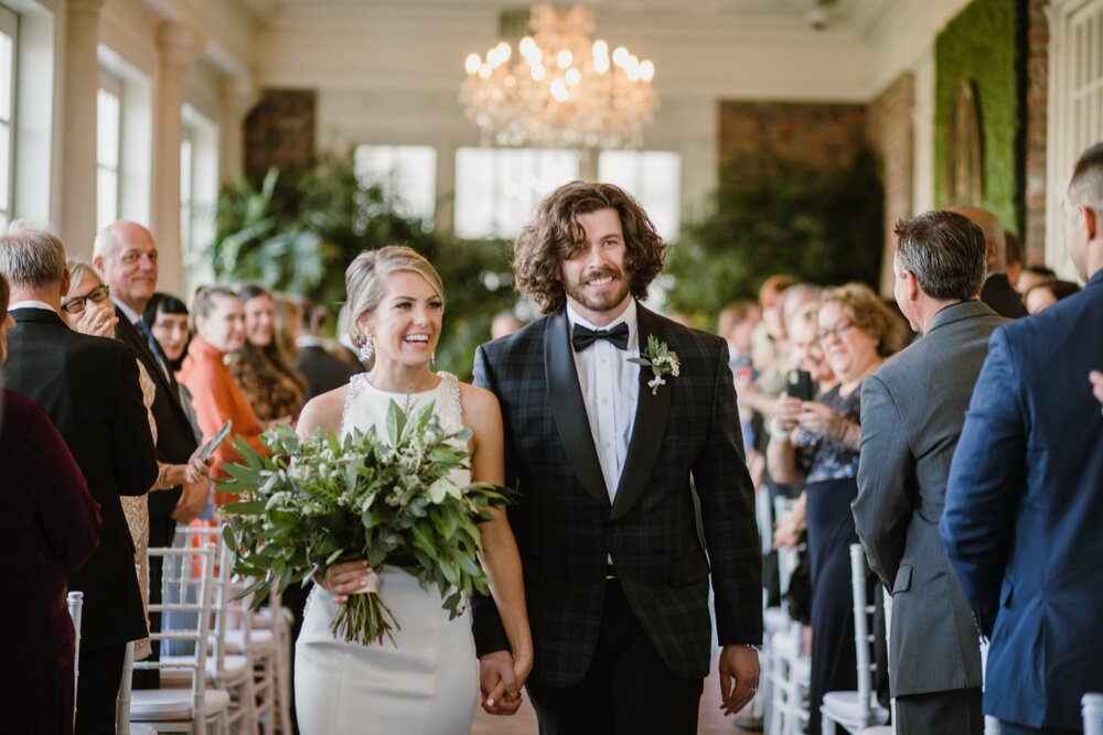  Intimate wedding ceremony | Sarah Mattozzi Photography | Black tie wedding at The Historic Cavalier Hotel, Virginia Beach | Tropical, elegant wedding inspiration, black tux groom, glam bride, greenery bouquets, sentimental, classic, minimalist weddi