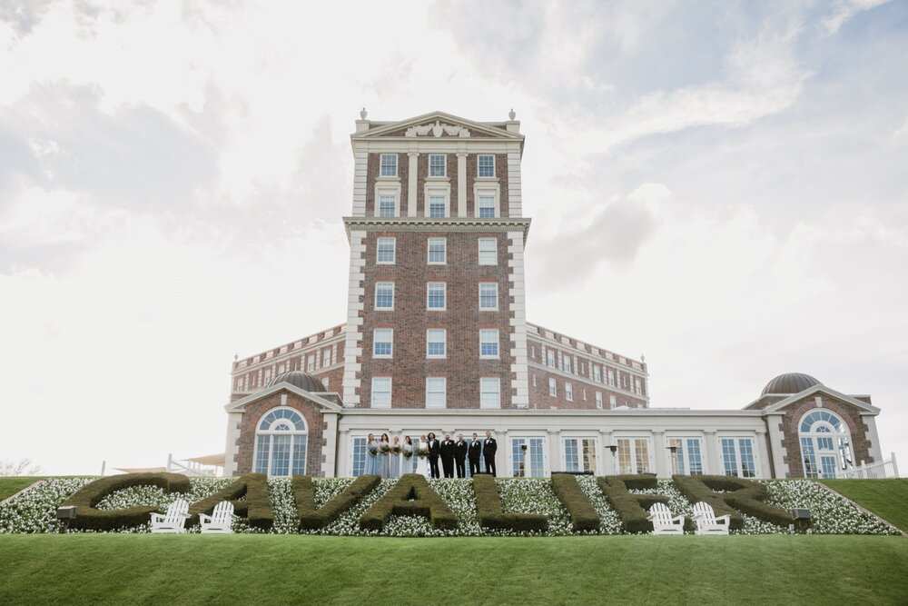  Wedding party portraits | Sarah Mattozzi Photography | Black tie wedding at The Historic Cavalier Hotel, Virginia Beach | Tropical, elegant wedding inspiration, black tux groom, glam bride, greenery bouquets, sentimental, classic, minimalist wedding