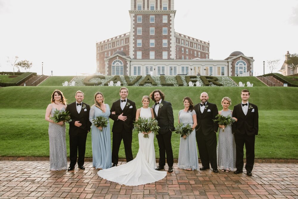  Wedding party portraits | Sarah Mattozzi Photography | Black tie wedding at The Historic Cavalier Hotel, Virginia Beach | Tropical, elegant wedding inspiration, black tux groom, glam bride, greenery bouquets, sentimental, classic, minimalist wedding