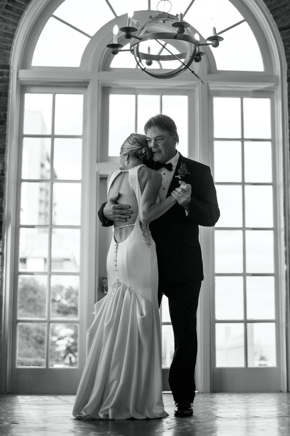  Father daughter dancing | Sarah Mattozzi Photography | Black tie wedding at The Historic Cavalier Hotel, Virginia Beach | Tropical, elegant wedding inspiration, black tux groom, glam bride, greenery bouquets, sentimental, classic, minimalist wedding