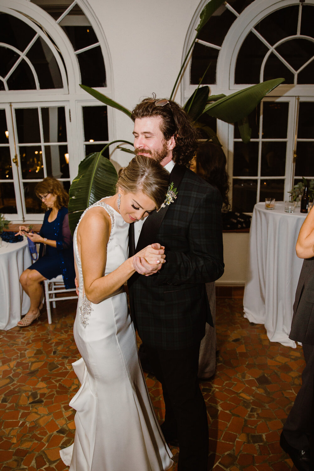  Reception dancing | Sarah Mattozzi Photography | Black tie wedding at The Historic Cavalier Hotel, Virginia Beach | Tropical, elegant wedding inspiration, black tux groom, glam bride, greenery bouquets, sentimental, classic, minimalist wedding. 