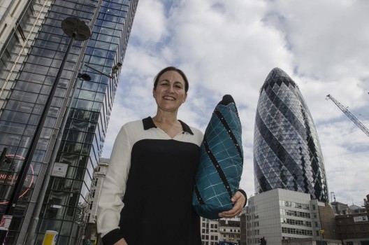 Ben Rowe's picture of me holding Lucy Sparrow's Mini Gherkin, part of her Ministructures series featured in Time Out. 