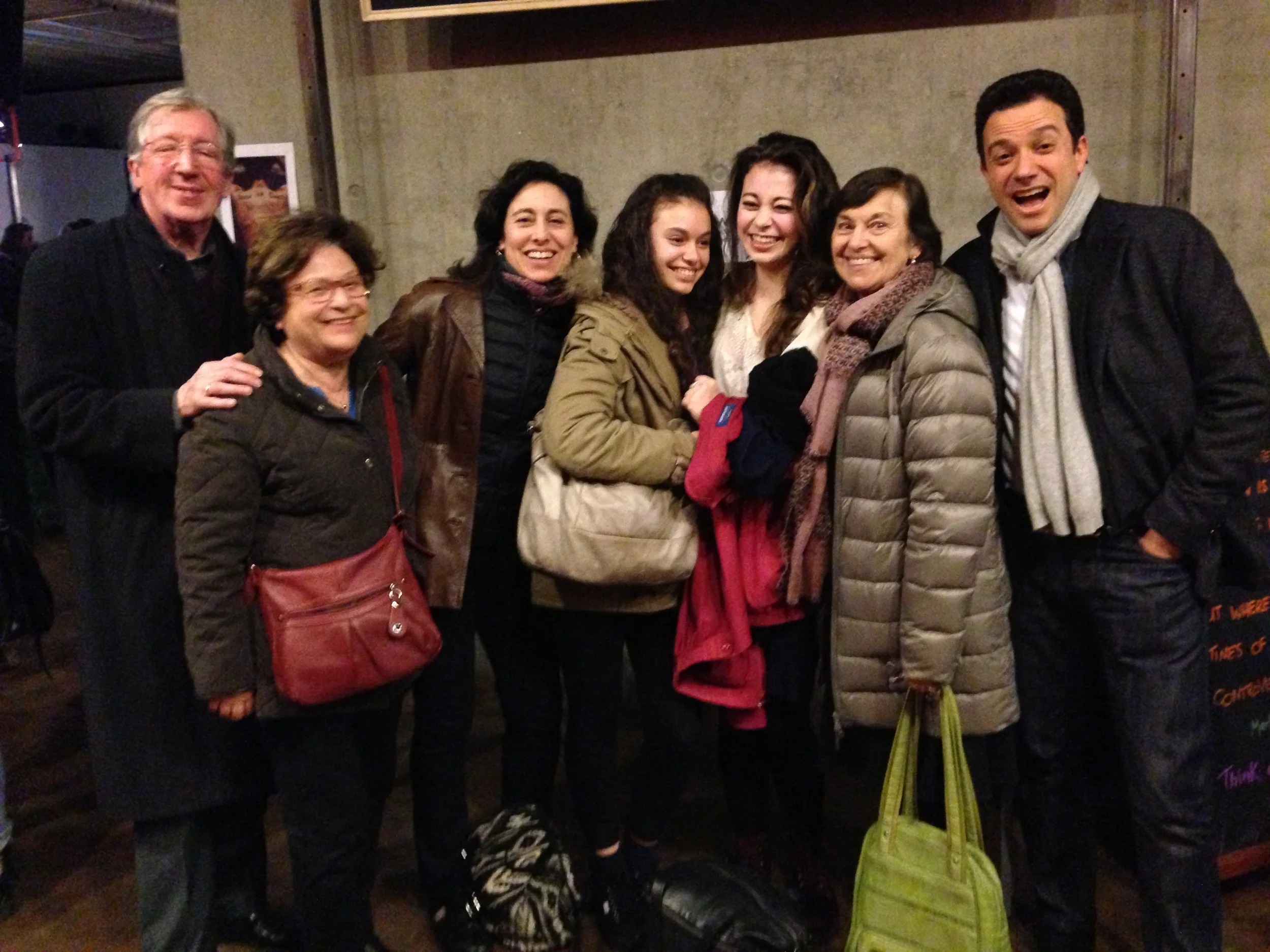 Sarah and her husband Alain with family and friends including daughters Ambre and Lara