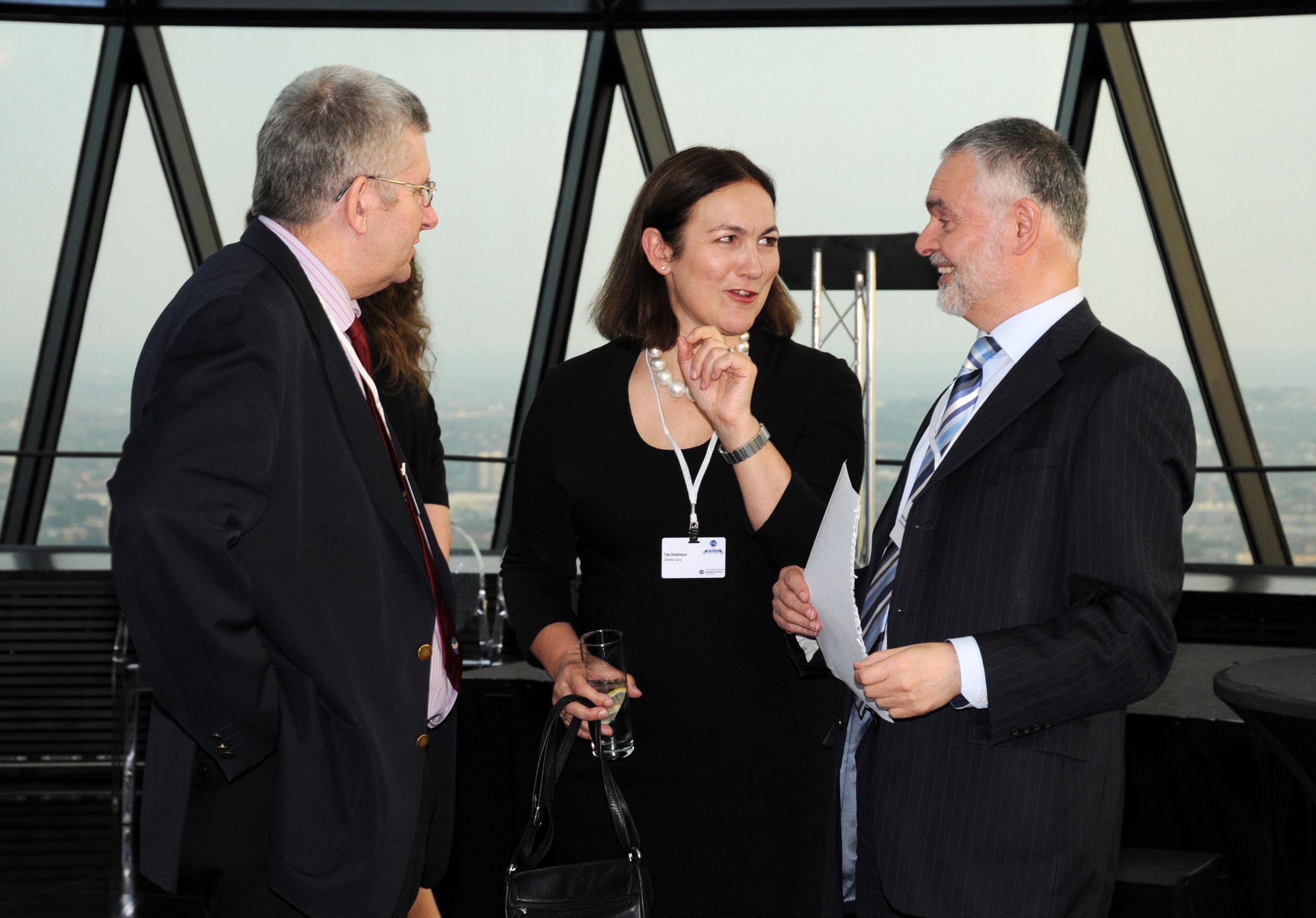 Discussing the Gherkin Photo © Richard Johnson
