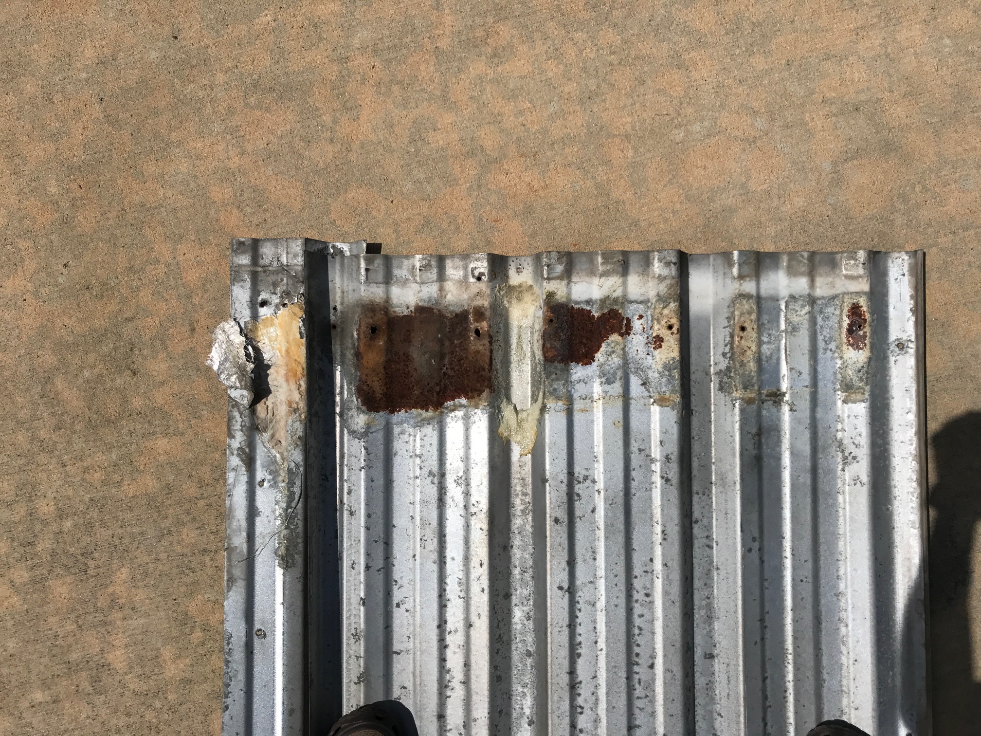The panel didn't look too bad from the top, but the bottom is almost gone.
