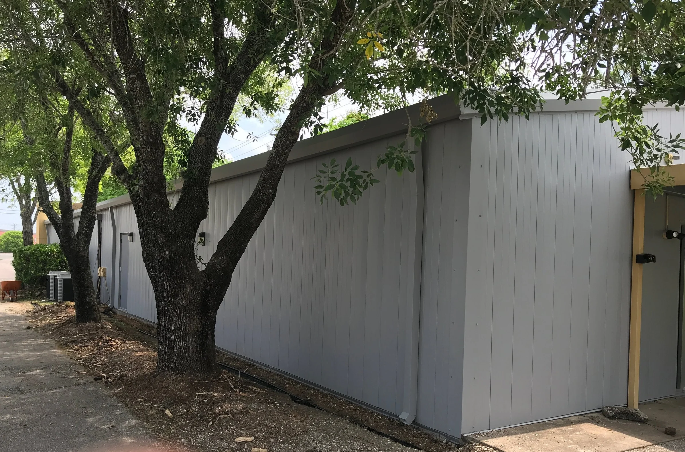 Finished wall panel and gutter replacement, One of many metal wall panel replacement options