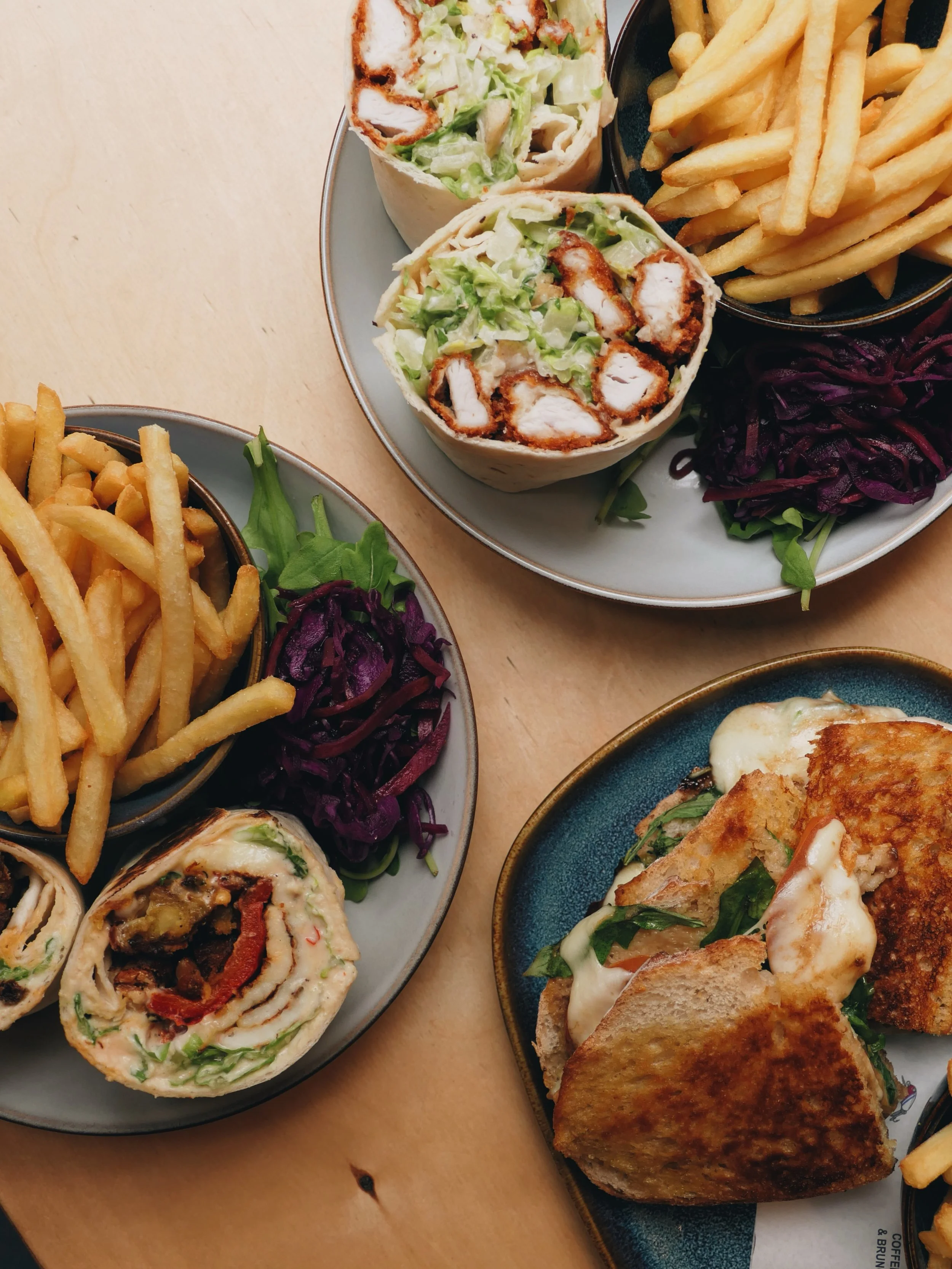 New wrap and toastie additions to our brunch menu, served with fried and slaw. Pictured is the Caprese Melt, Chicken Caesar Wrap and Falafel &amp; Halloumi Wrap. Available til 2pm 👍✌️