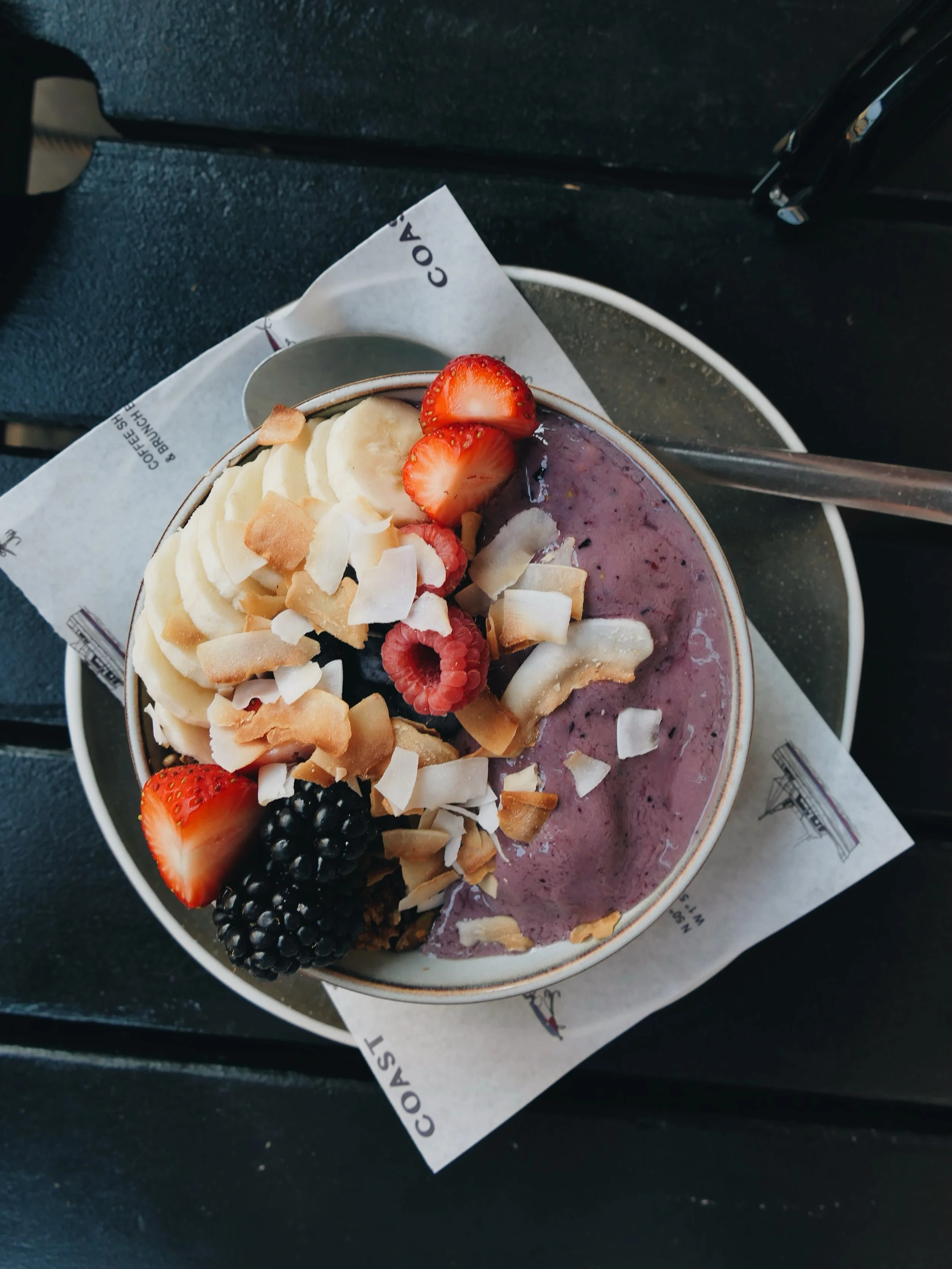 Morning breakfast smoothie bowl: A&ccedil;ai, strawberry, mango and blueberry blend, finished with granola,
banana and fresh berries.