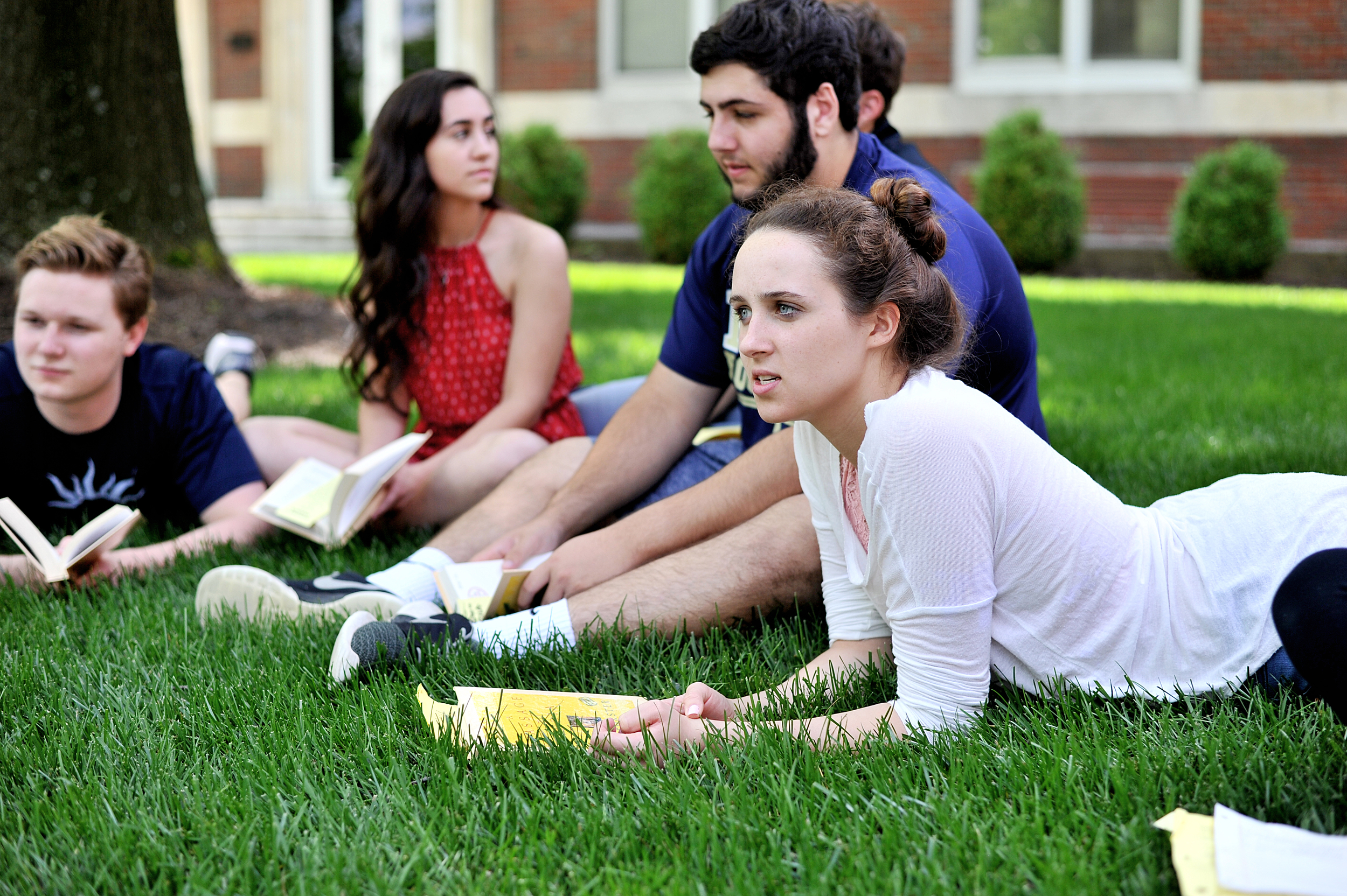 Ali Speiss discusses a portion of "A Passage to India" with her classmates during their senior Honors English Class at Wyomissing High School on May 23, 2016, in Wyomissing, PA. Sam Gust, Amanda Bollinger, and Paul Feightner are pictured in the background. (Reading Eagle: Sarah Stier)
