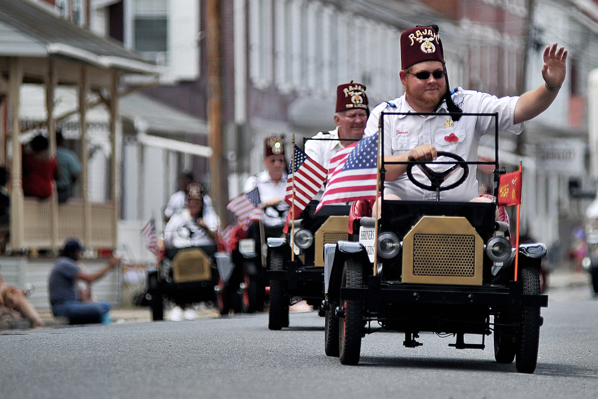 Members of the Rajah Shrine Tin Lizzies entertain the crowd at the Bernville Memorial Day Parade in Bernville, PA, in small model T cars on May 30, 2016. (Reading Eagle: Sarah Stier)