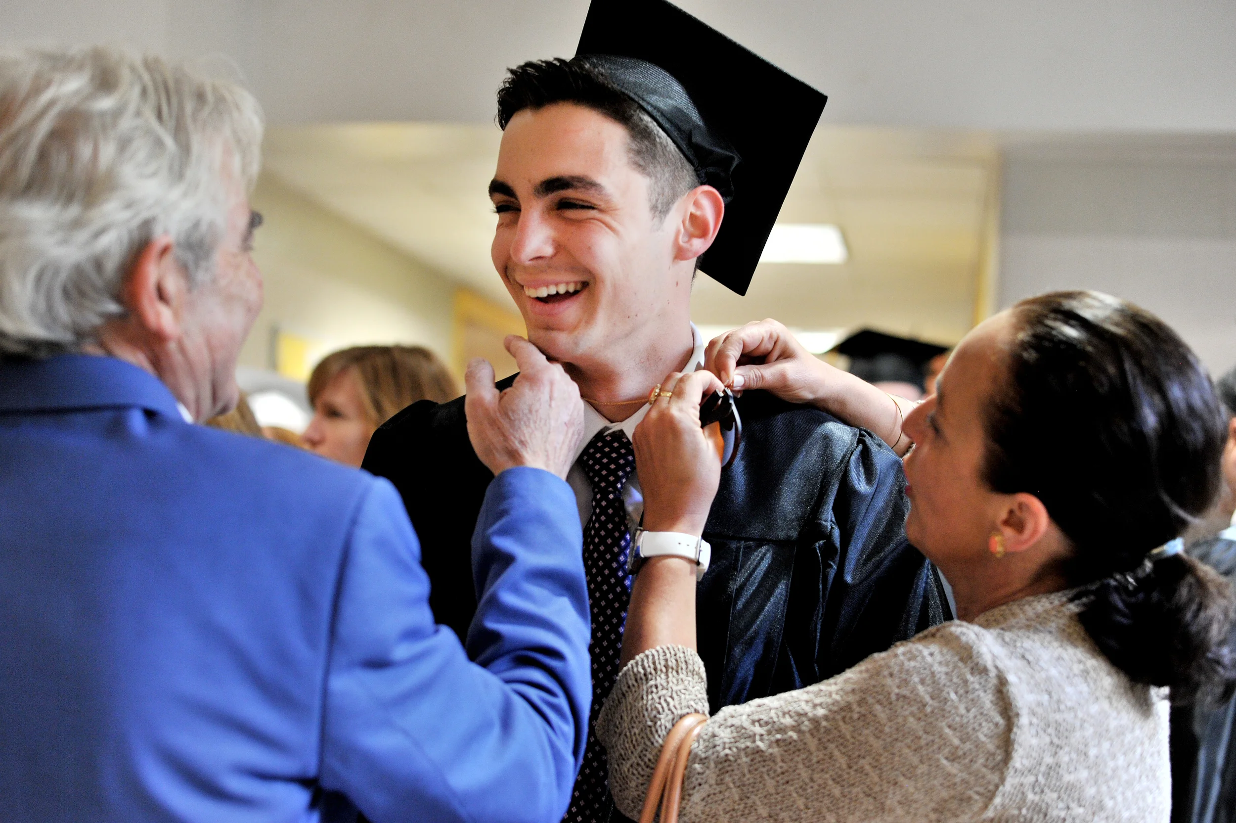 Juan Soria, 18, is greeted by his parents, Manuel and Magdalena, prior to the Berks Catholic High School graduation on June 8, 2016, at Alvernia University in Reading, PA. (Sarah Stier: Reading Eagle)
