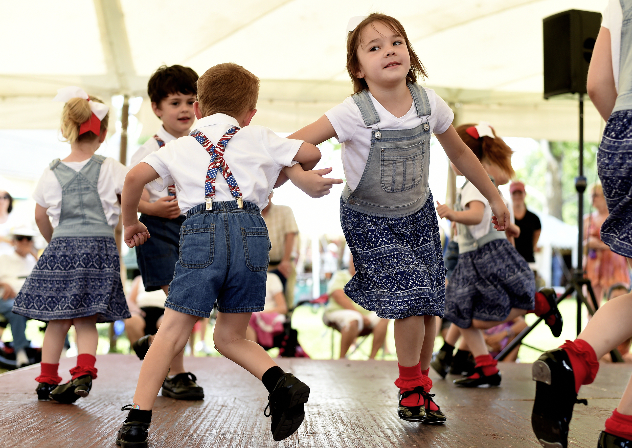 Sarah Schaeffer, 6, of Kutztown dances with her partner Blake Losito, 4, of Hamburg at the Kutztown Folk Festival in Kutztown, PA, on July 6, 2016. (Reading Eagle: Sarah Stier)