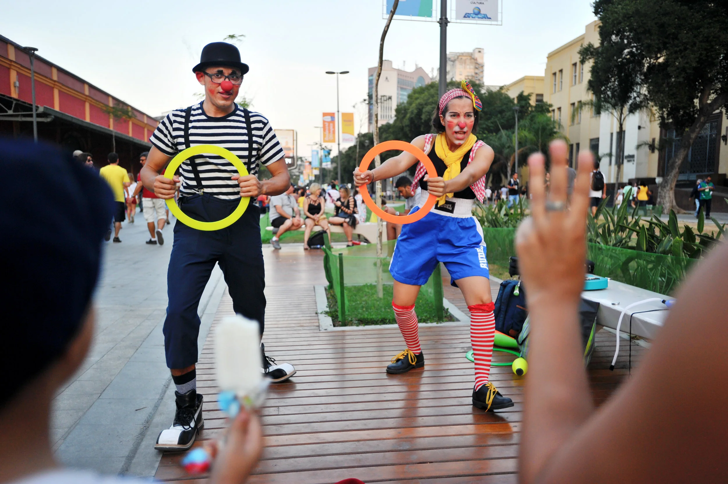 Benedict Hermano of Rio and Anna Olivera of Manaus entertain parents and children at the Opening Ceremony celebration at Olympic Boulevard in Rio de Janeiro, Brazil, on August 5, 2016. (Sarah Stier | Ball State at the Games)