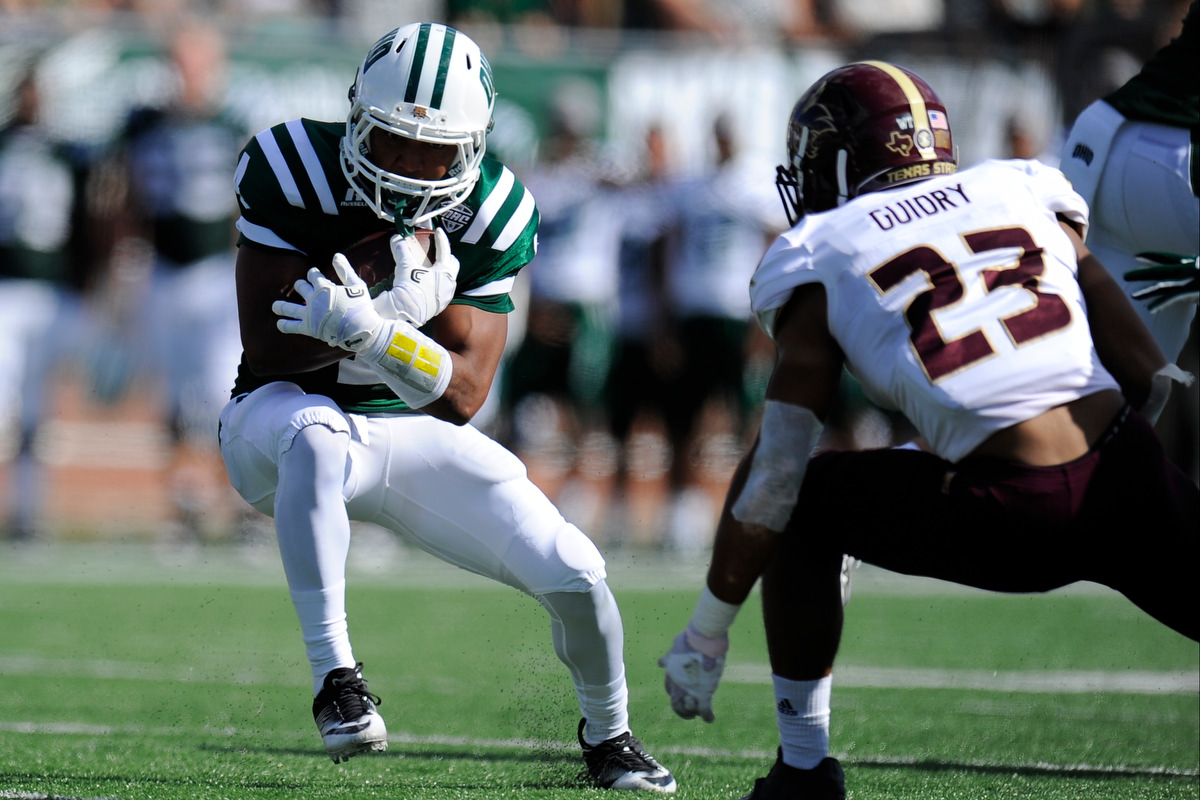 Ohio's sophomore running back Papi White carries the ball during the game against Texas State on September 3, 2016, in Athens, Ohio. After a back and forth game that went into triple overtime, the Bobcats dropped the game to Texas State 56-54.