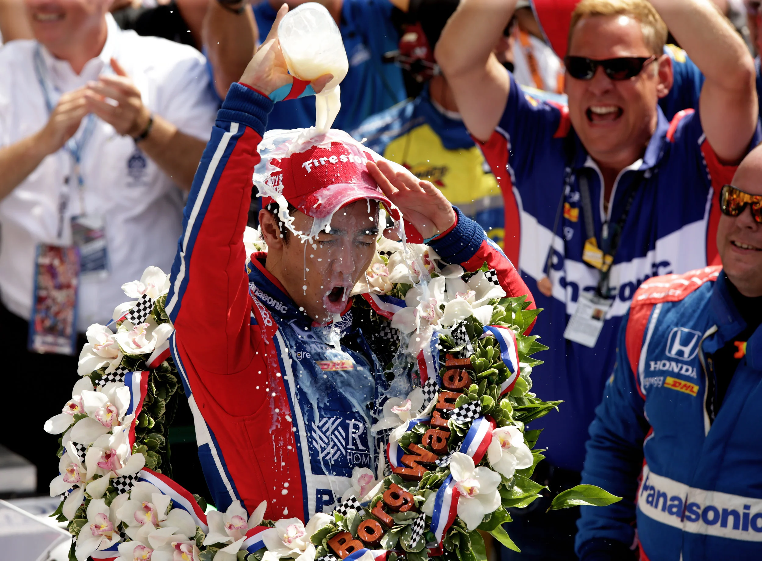 Andretti Autosport IndyCar driver Takuma Sato celebrates his 2017 Indy 500 win with the iconic milk drink in Victory Lane at Indianapolis Motor Speedway on Sunday, May 28, 2017. This was his first Indy 500 win.