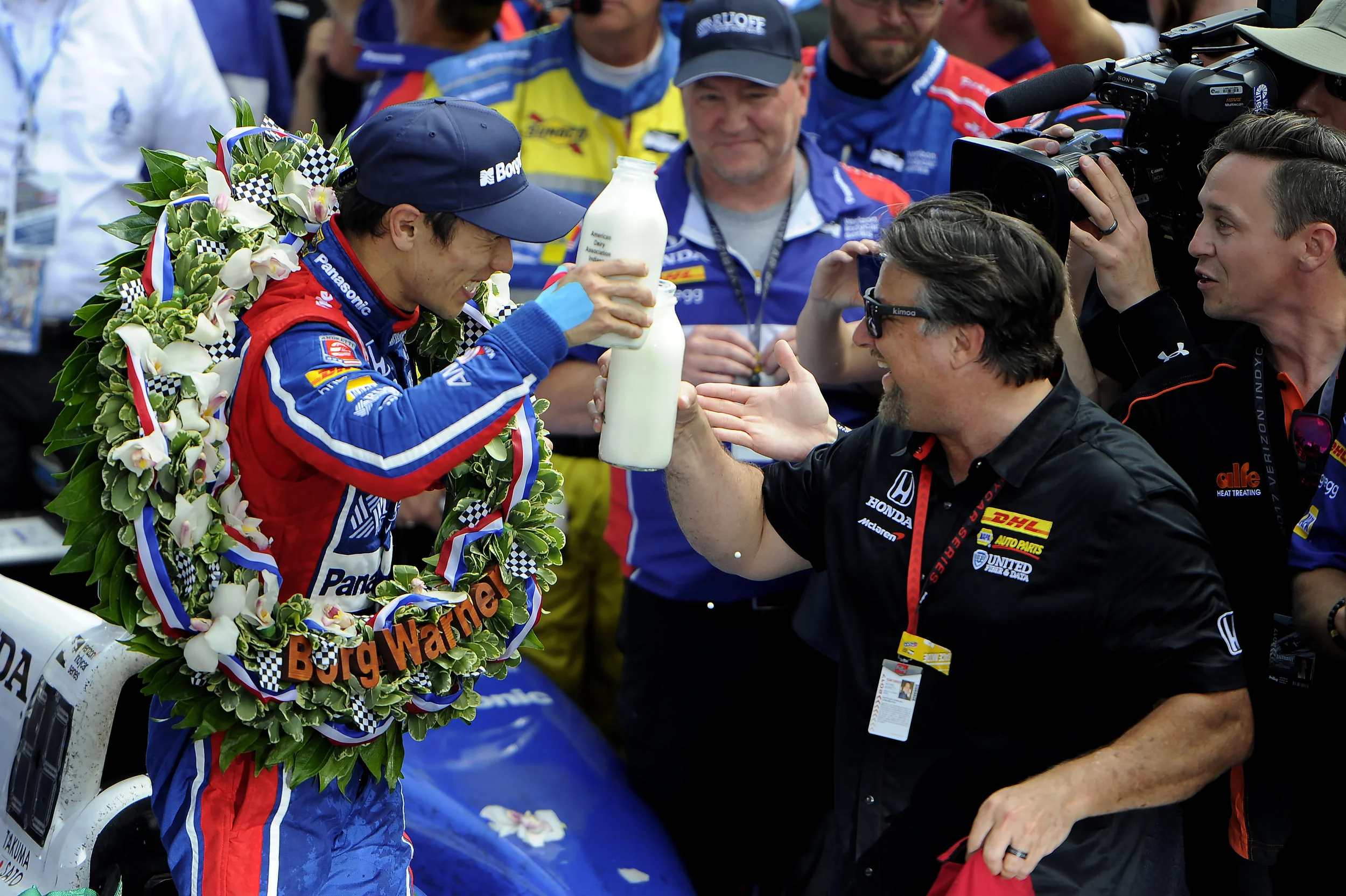 Andretti Autosport IndyCar driver Takuma Sato celebrates his 2017 Indy 500 with Michael Andretti in Victory Lane at Indianapolis Motor Speedway on Sunday, May 28, 2017. This was his first Indy 500 win.