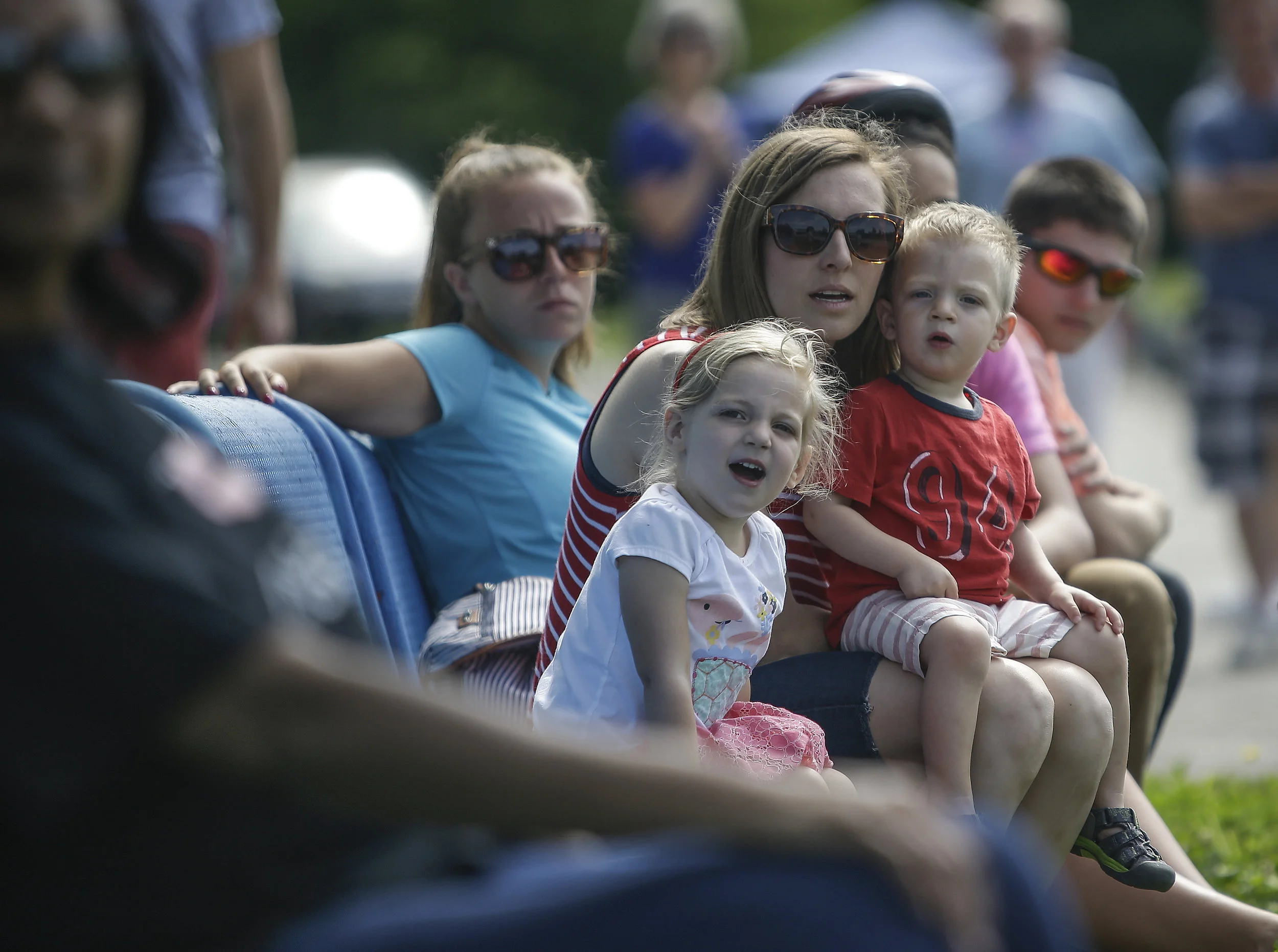 Ashley Lauogh watches the derby car races with her son Cohen, 2, and Myla, 4, at the 15th Annual Mayor's Cup on Saturday, June 3, 2017.
