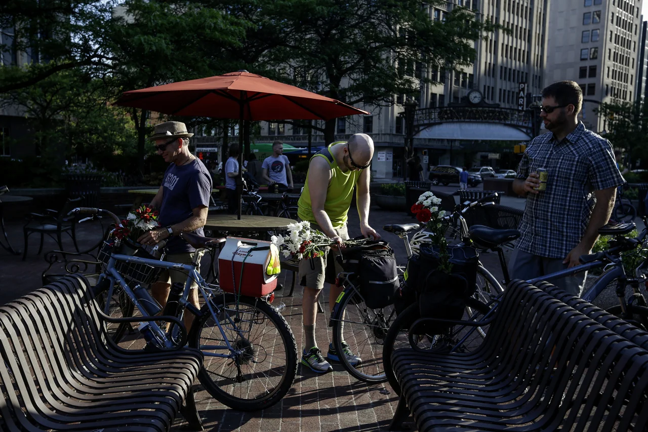 Cyclists decorate their bikes with flowers at Bike Party Indianapolis in downtown Indianapolis on Friday, June 9, 2017. The cyclists could win prizes for the best decorated bike.