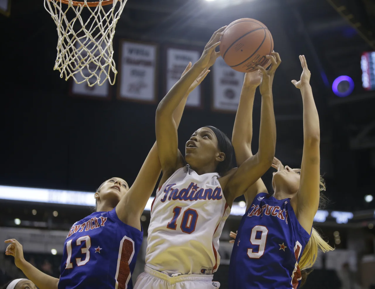 New Albany’s Chyna Anthony (10), Metcalfe County’s Mackenzie Coleman (13), and Franklin County’s Rebecca Cook (9) at the Indiana vs. Kentucky High School All-Star game at Bankers Life Fieldhouse in Indianapolis on Saturday, June 10, 2017.