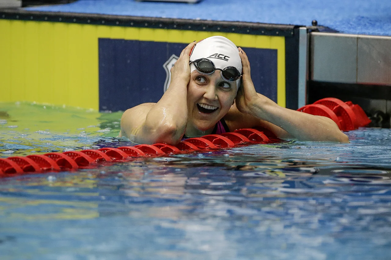 Hannah Moore smiles after seeing her winning time in the 1500-meter freestyle race at the Phillips 66 National Championships at IUPUI Natatorium in Indianapolis on Saturday, July 1, 2017. Moore finished first in the event, claiming her spot on Team USA for the World Championships in Budapest, with a time of 16:08.68.