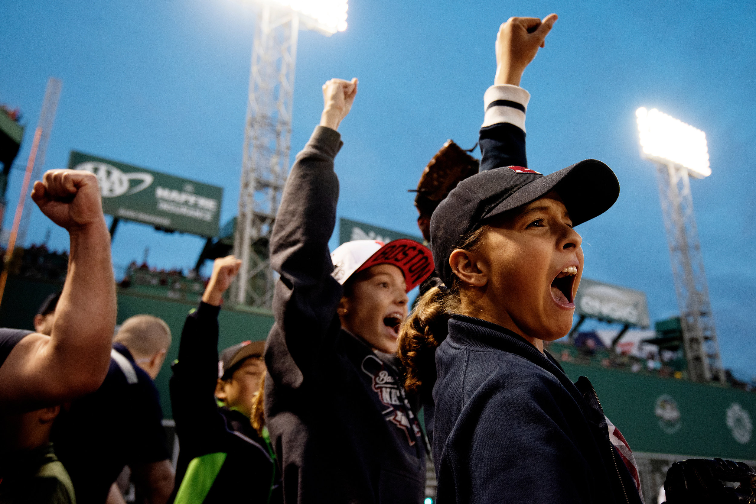  Fans react after the Red Sox's final win of the season over the New York Yankees at Fenway Park in Boston, Massachusetts, on Sunday, September 30, 2018. 