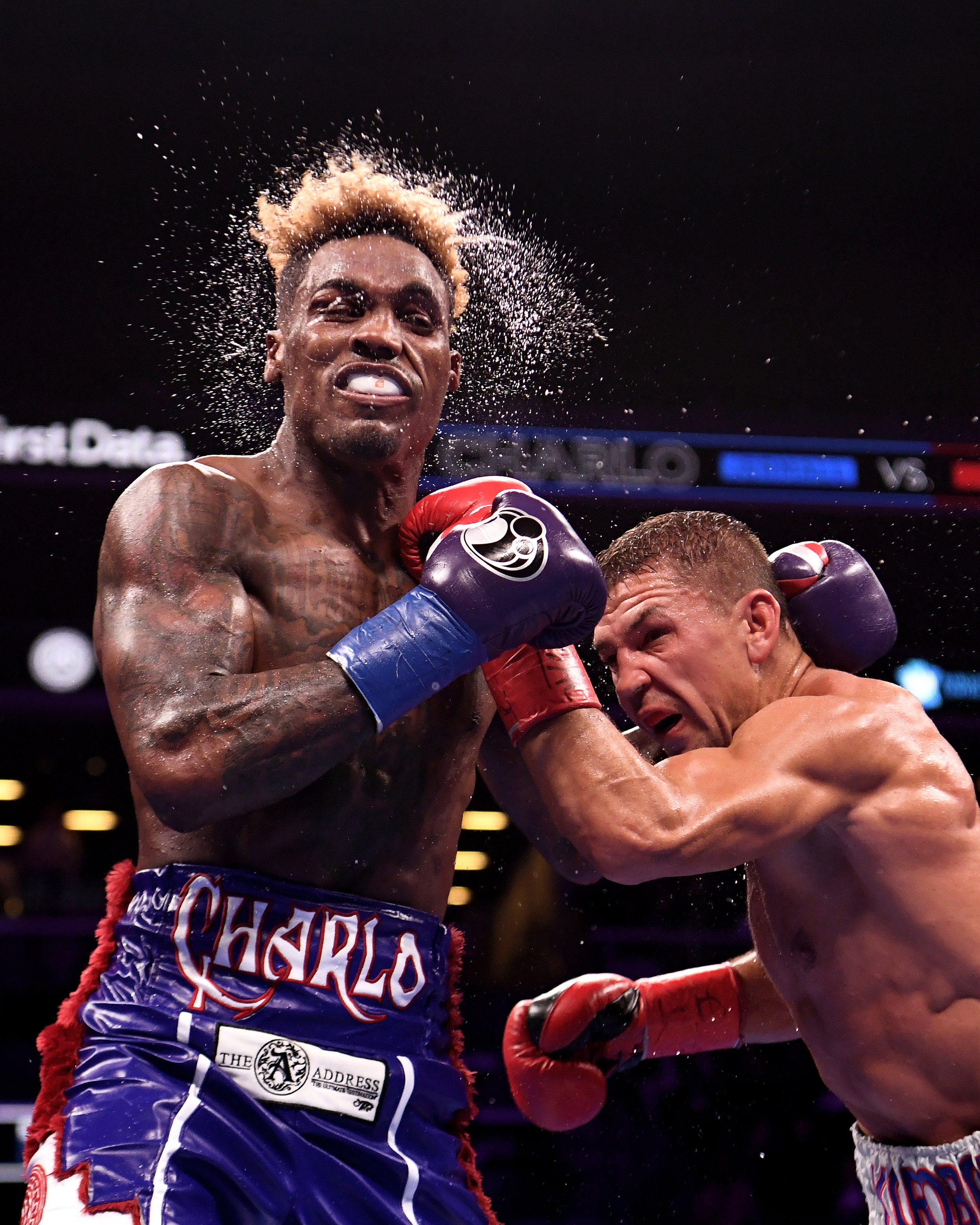  Matt Korobov punches Jermall Charlo during their WBC Interim Middleweight Championship bout at Barclays Center on December 22, 2018 in the Brooklyn borough of New York City. 