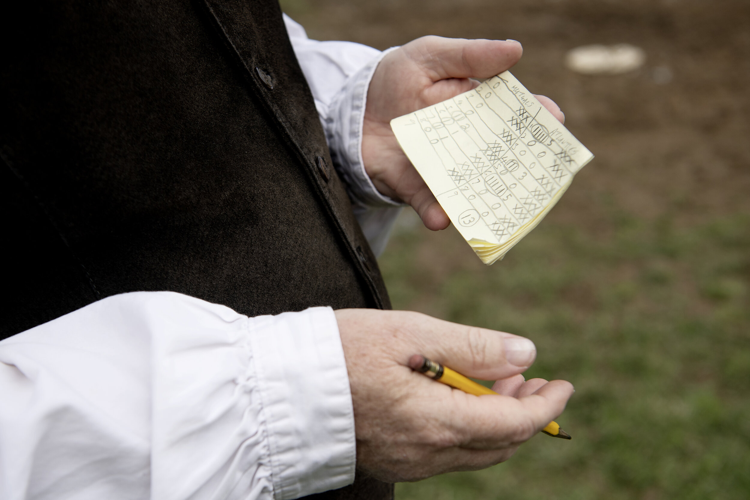  An umpire keeps score during the game between the New York Mutuals and the Brooklyn Atlantics with a system of X's and tallies to denote runs and strikes at Old Bethpage Village Restoration on April 13, 2019 in Old Bethpage, NY. The Brooklyn Atlanti