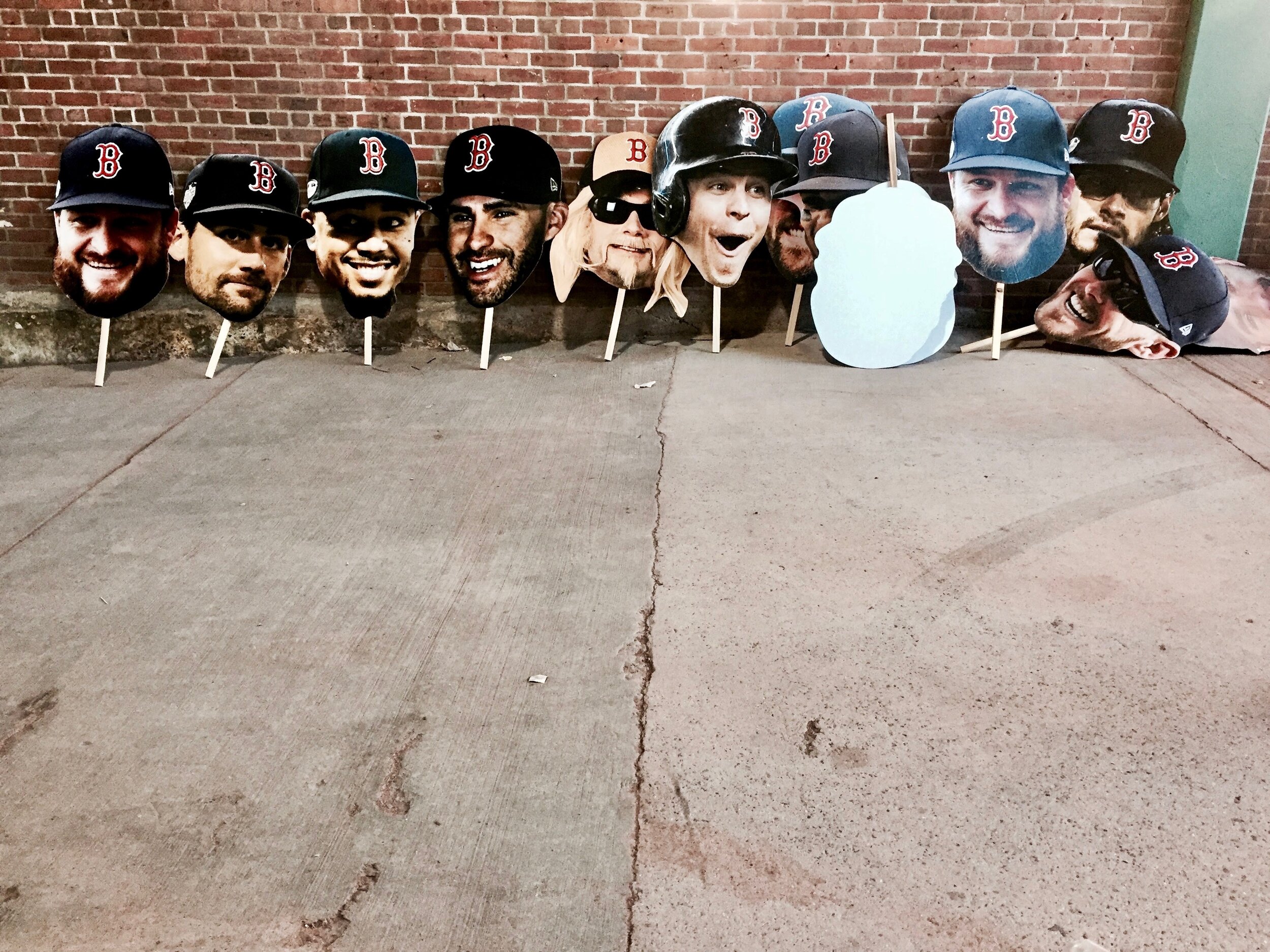  Cardboard cutouts of Boston Red Sox players’ faces wait to be loaded onto duck boats for the parade celebrating the World Series champions in Boston, Massachusetts, on October 31, 2018. (Shot on iPhone) 