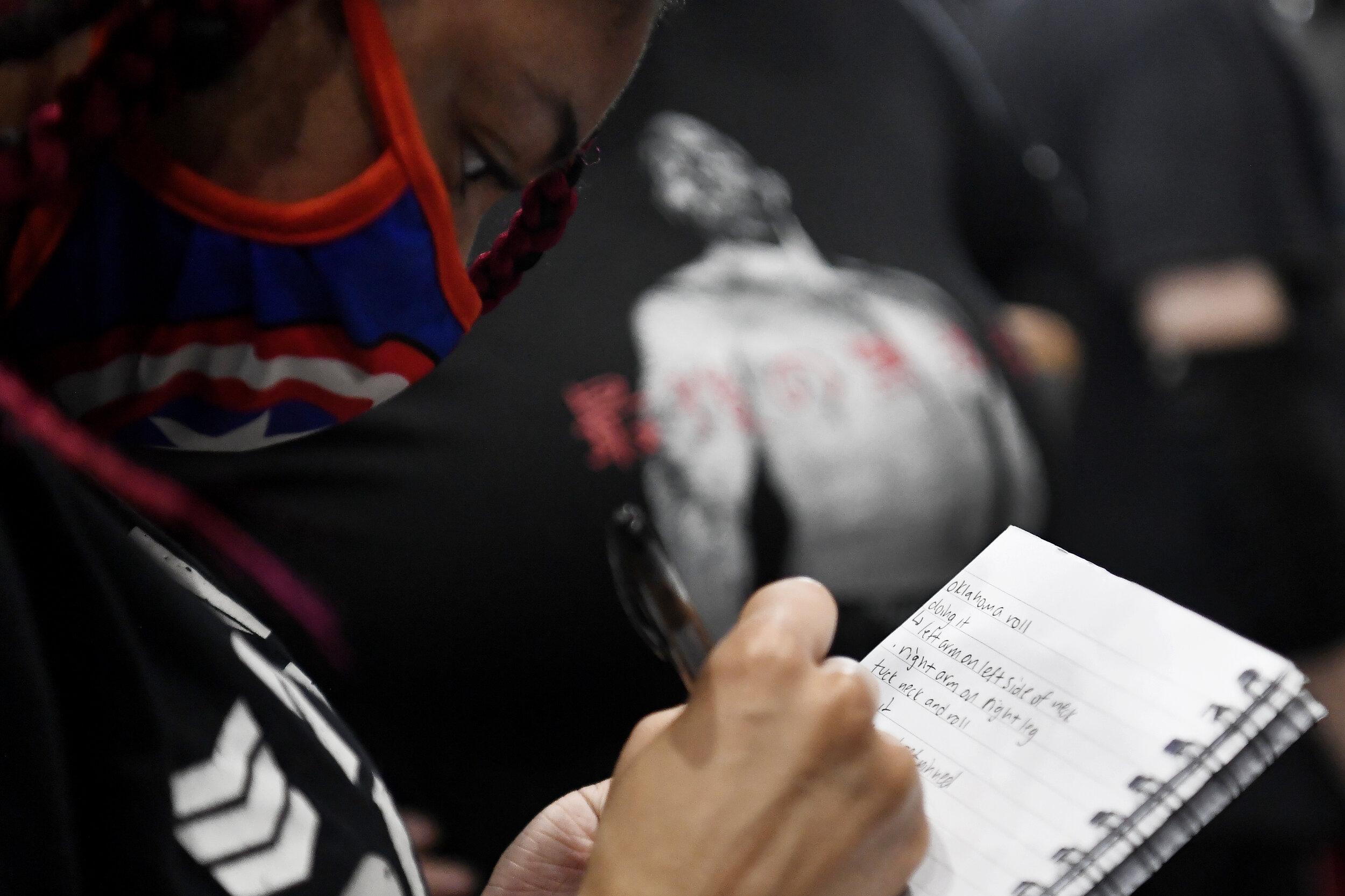  Wrestling student Indigo Detry takes notes during a practice session at Technique 2 Training Wrestling Academy on October 28, 2018, in Williamsburg, Brooklyn, New York. 