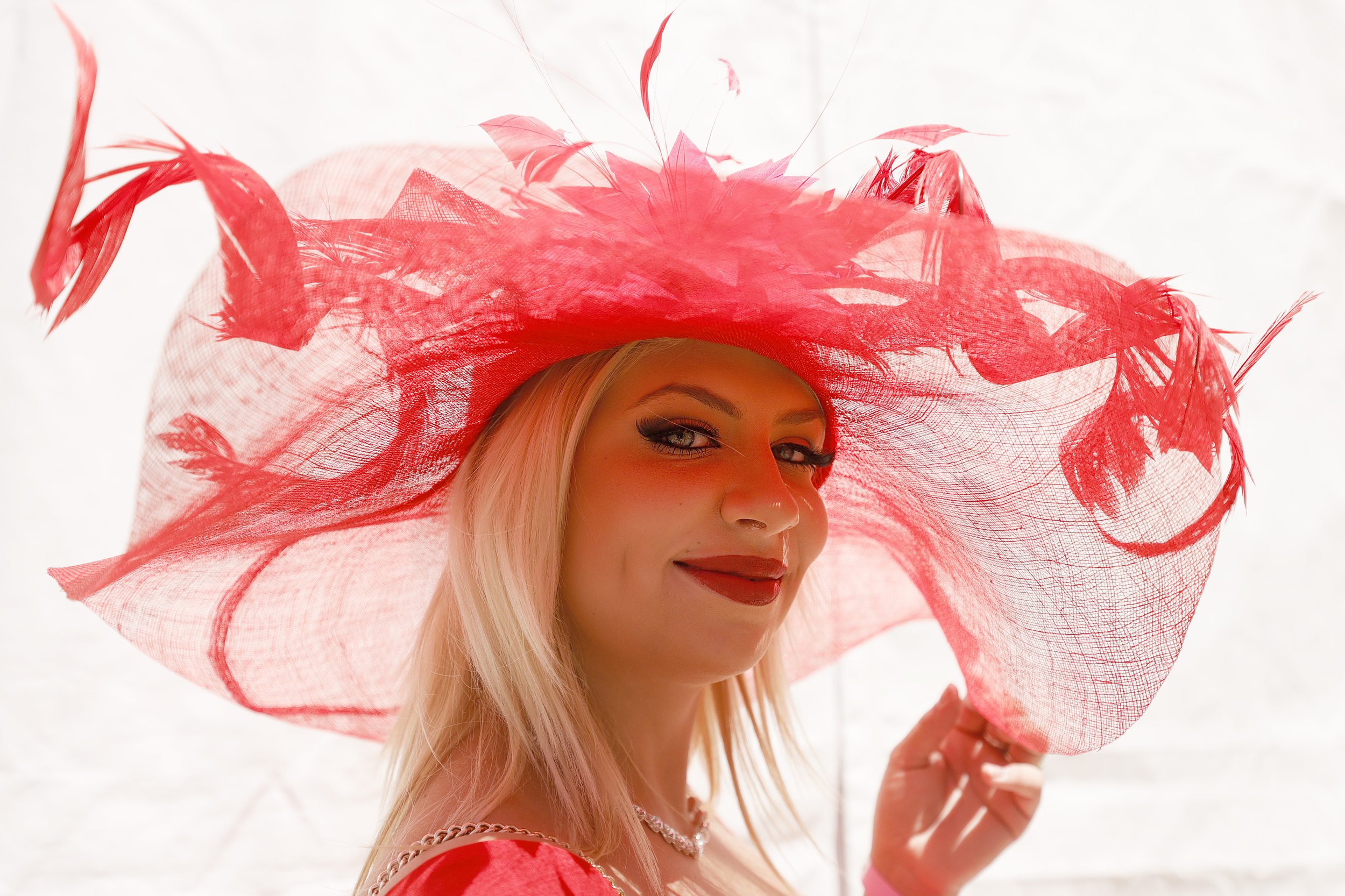  A fan poses in the paddock prior to the 2021 Kentucky Oaks at Churchill Downs on April 30, 2021 in Louisville, Kentucky. 