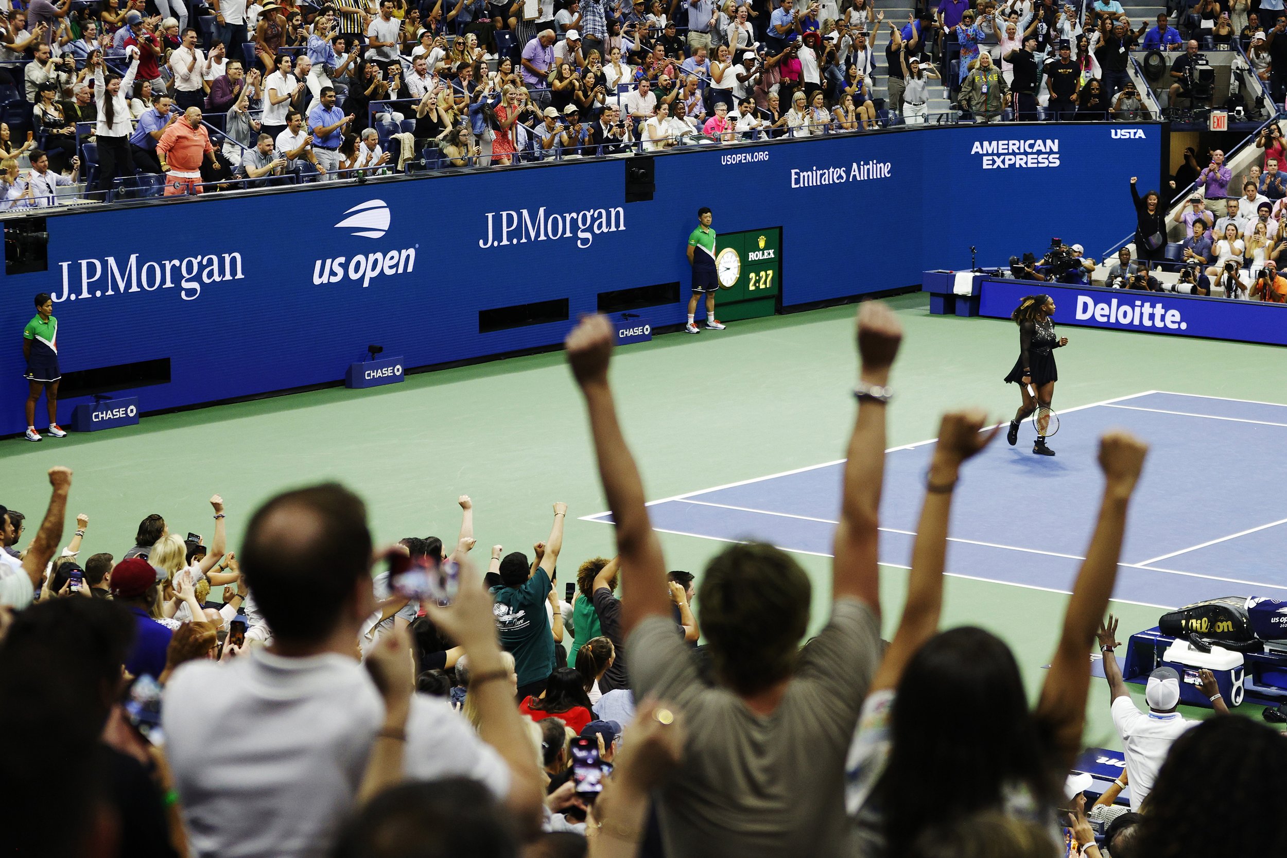  Fans cheer as Serena Williams of the United States celebrates after defeating Anett Kontaveit of Estonia in their Women's Singles Second Round match on Day Three of the 2022 US Open at USTA Billie Jean King National Tennis Center on August 31, 2022 