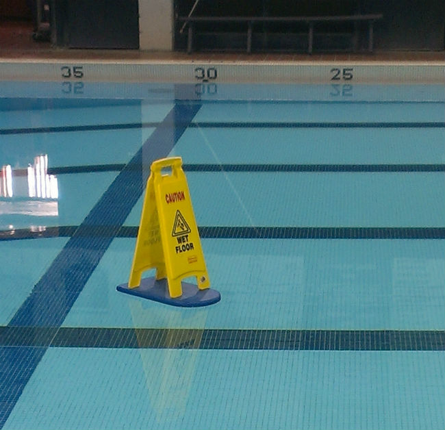 caution-wet-floor-in-the-pool.jpg