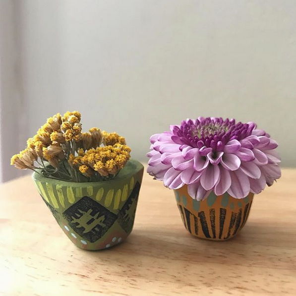 No air plant? Hold dried of fresh cut flower heads in them.
