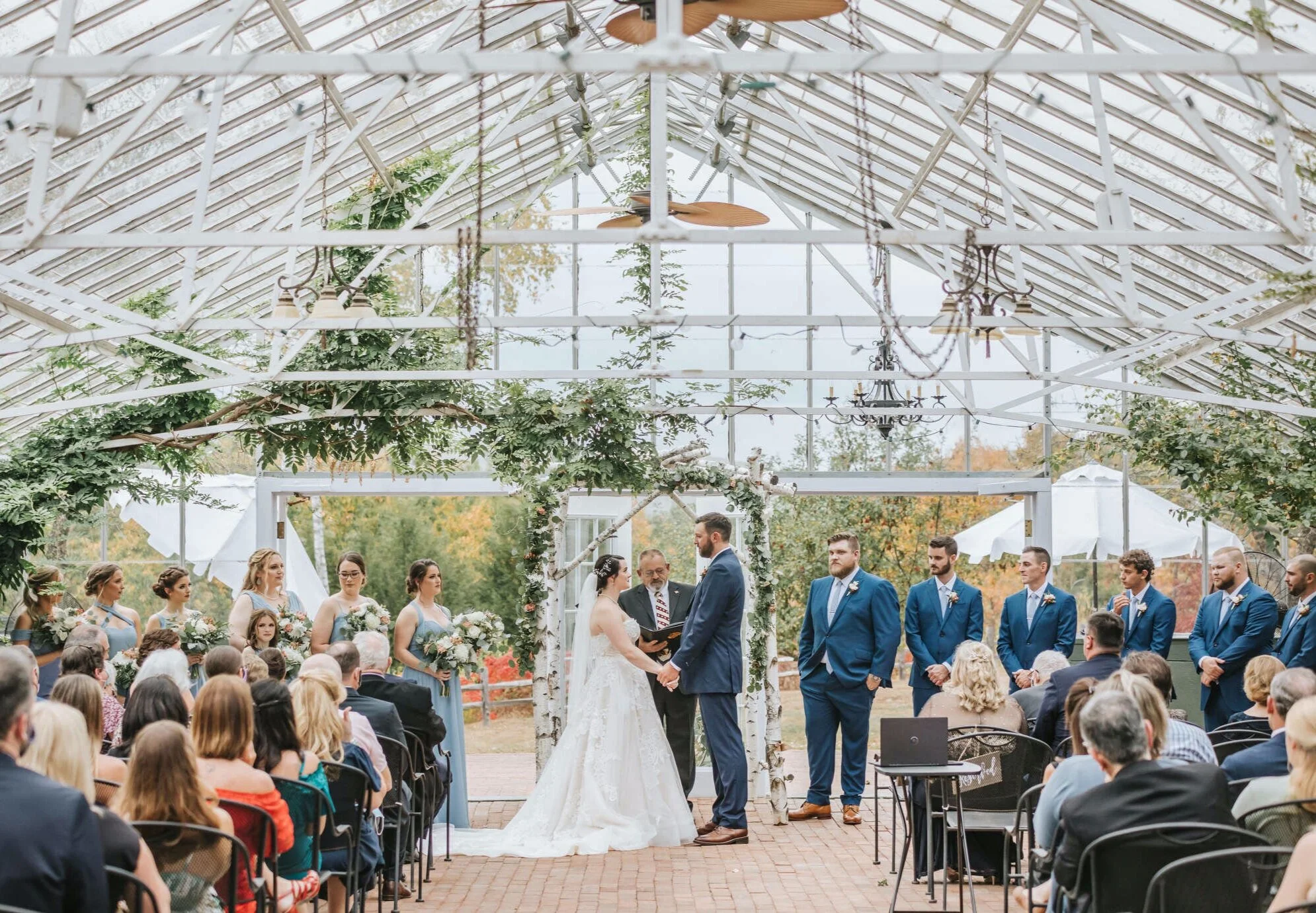 A fall greenhouse wedding at The Barn on the Pemi in Plymouth, NH