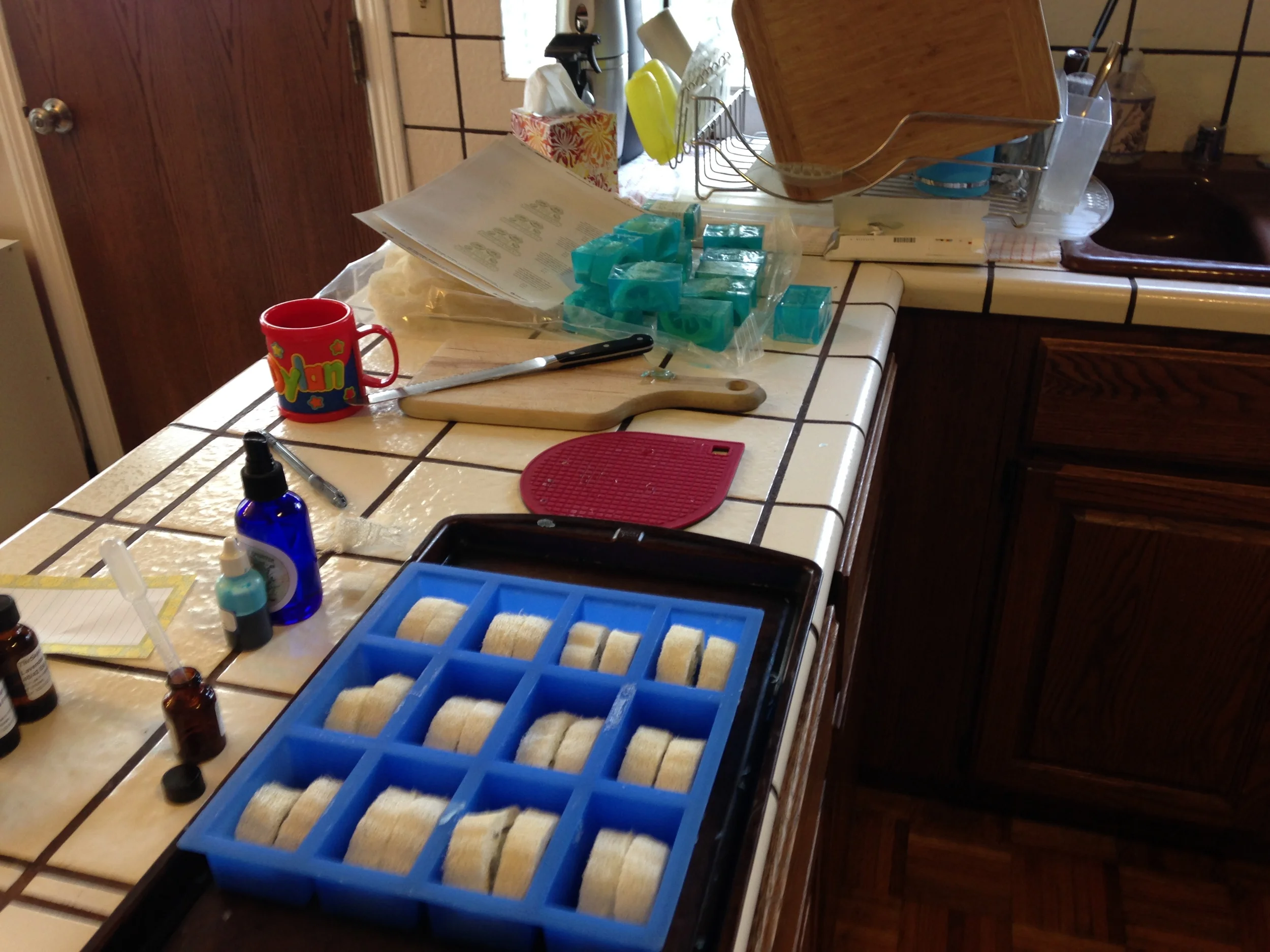 Loofahs in the mold, scented oils and colorant.
