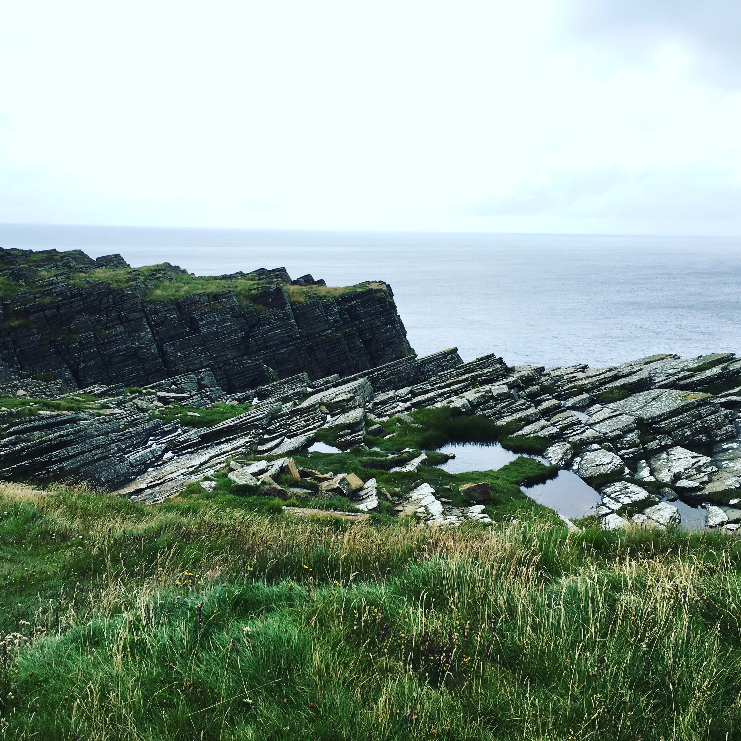 Majestic cliffs above the sea.