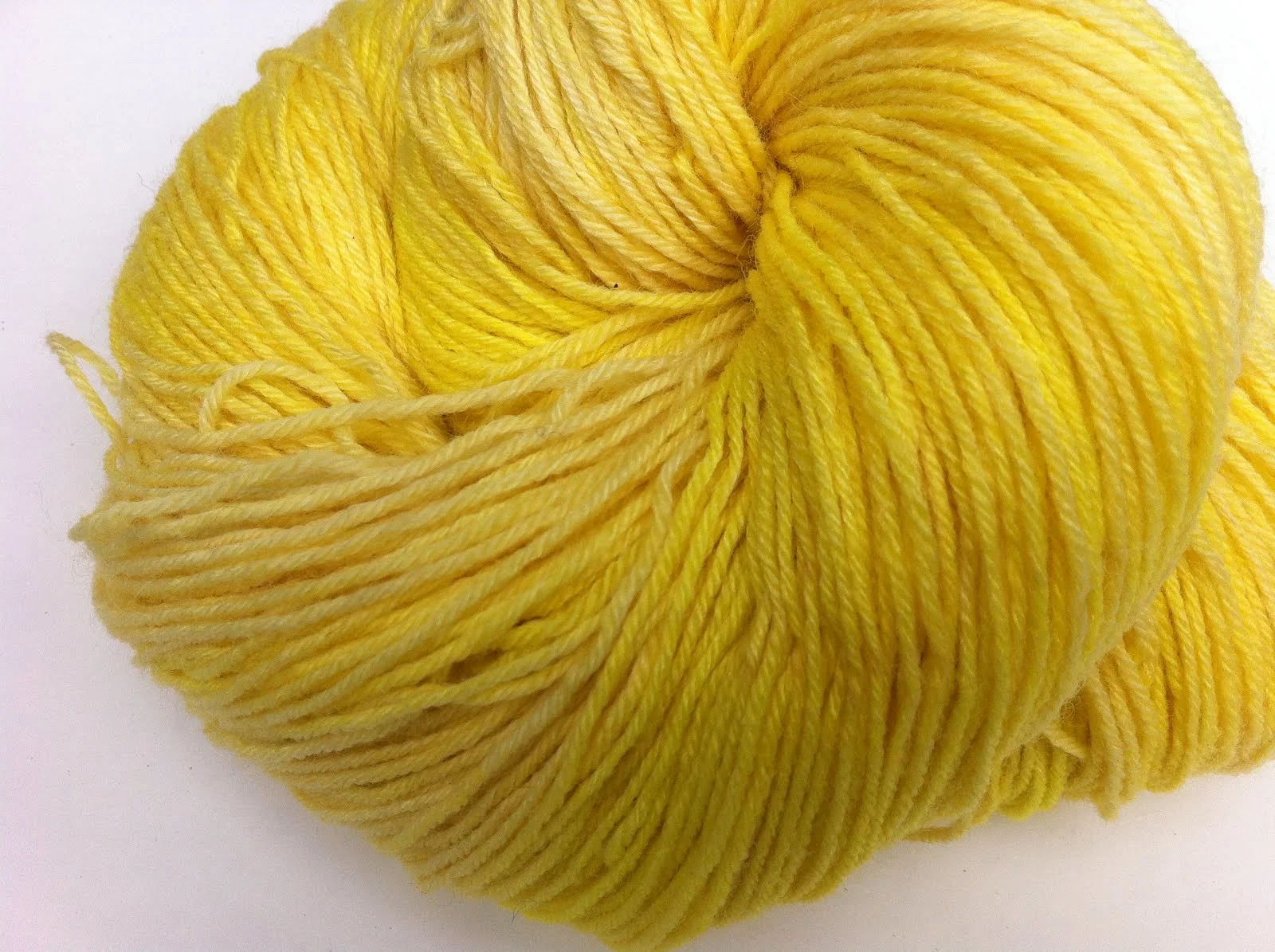Calendula and Weld both yield a bright sunny yellow with an alum mordant. I have also top dyed this beautiful color with indigo to get a fabulous yarn with greens, blues, and purples.