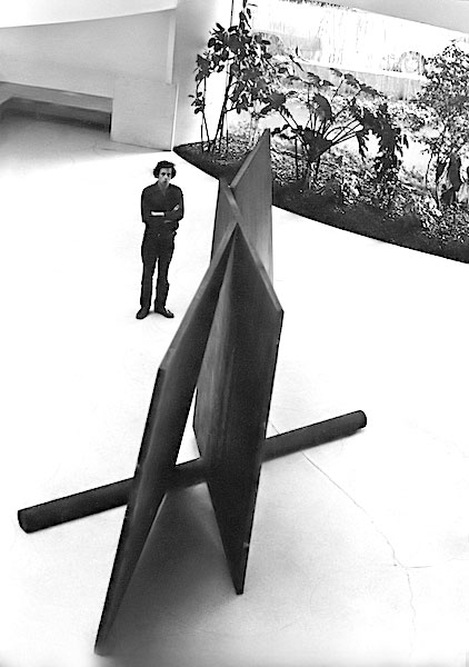 Philip Glass with Richard Serra sculpture at Guggenheim (1970)