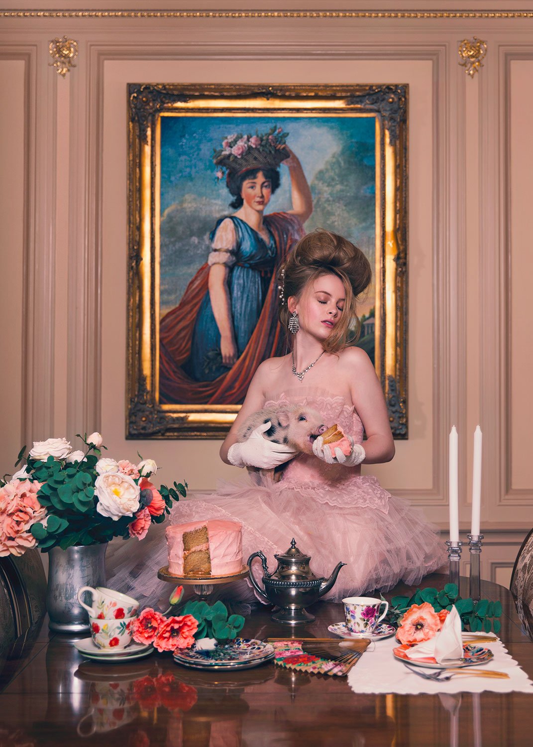  Theatrical conceptual portrait of a girl in a pink dress with a pig, showcasing MANICPROJECT’s ability to bring highly conceptual fantasy ideas to life in Salt Lake City with fine art storytelling 