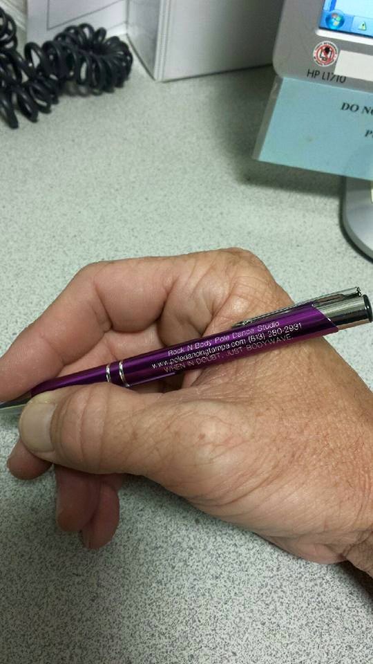 Kevin, our favorite grocery manager, loves to do his paperwork with his pen!