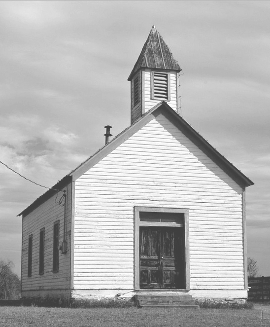 This is the kind of building I'm thinking of - not slick /somewhere between a schoolhouse and a chapel - of course we can't do clapboard siding or a real roof but white stained board and batten will give the same feel. 