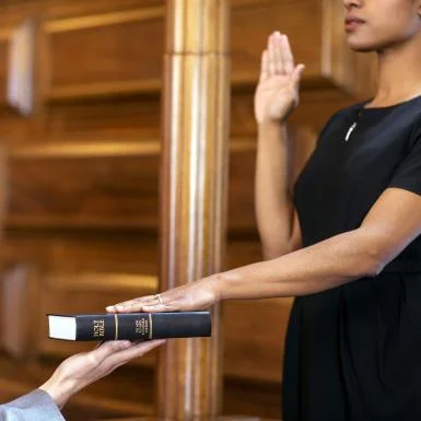 "I swear to tell the truth, the whole truth and... Why is my hand burning?"
