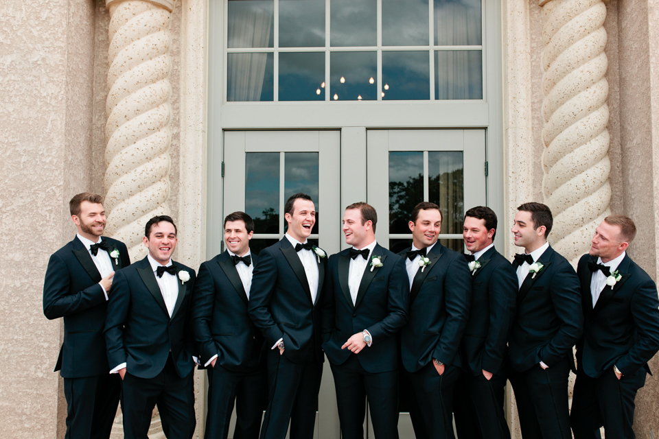 Image of a groom and his groomsmen on the wedding day at TPC Sawgrass in Ponte Vedra, Florida