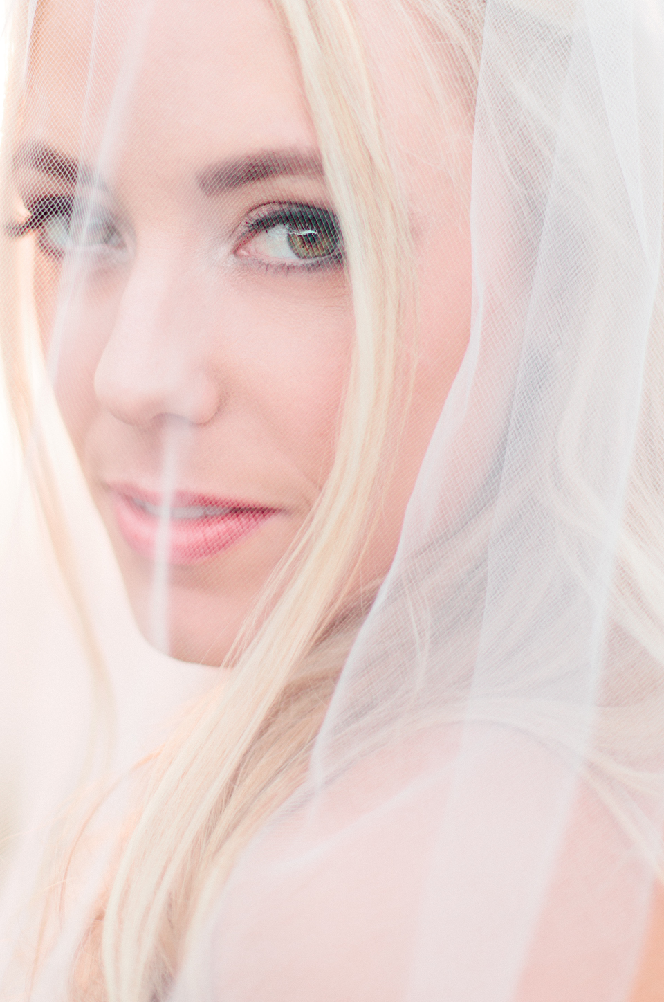 Picture of a bride under her veil on her wedding day at TPC Sawgrass in Ponte Vedra, Florida