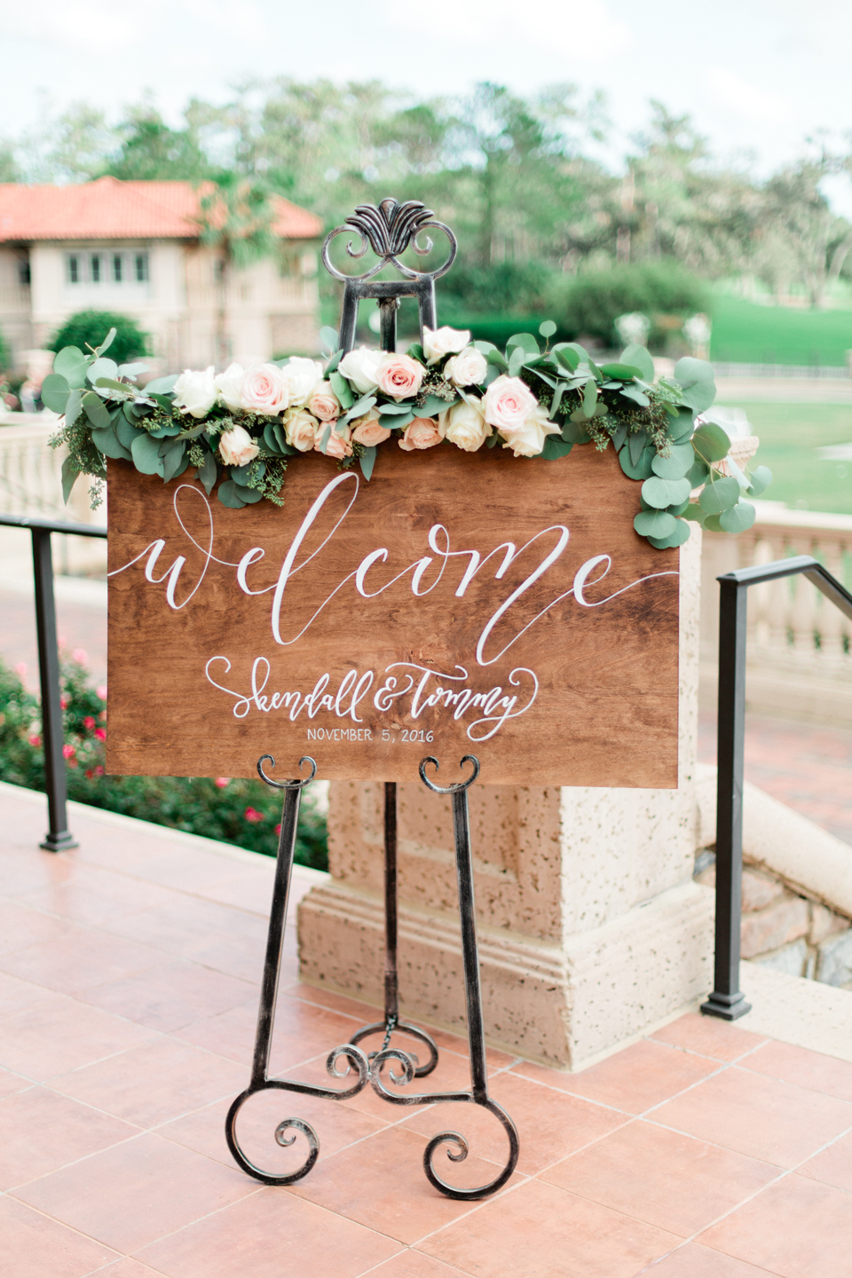 Image of wedding signage for the ceremony.  The sign says, "Welcome" in hand lettering.  The wedding is at TPC Sawgrass in Ponte Vedra, Florida
