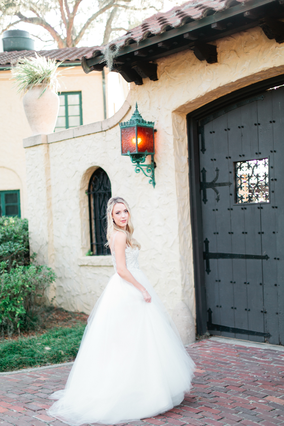 Picture of a bride in a Calvet Couture wedding gown at the historic Epping Forest Yacht Club in Jacksonville, Florida