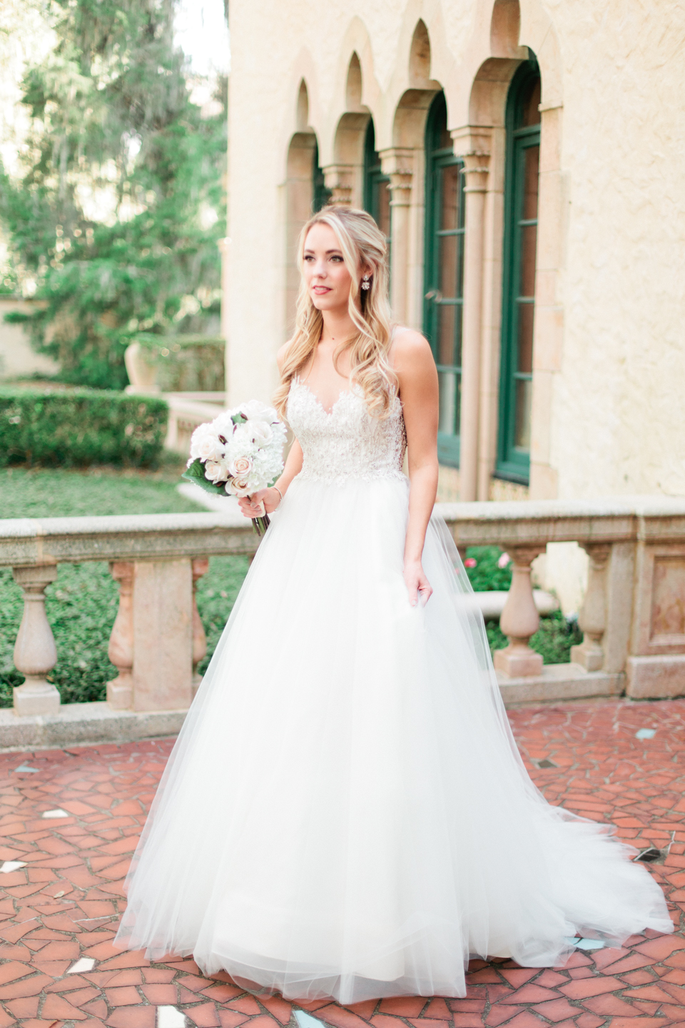 Image of a bride in a Calvet Couture wedding gown at the Epping Forest Yacht Club in Jacksonville, Florida