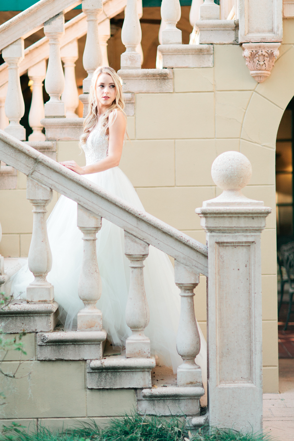 Picture of a bride on the staircase at Epping Forest Yacht Club in Jacksonville, Florida