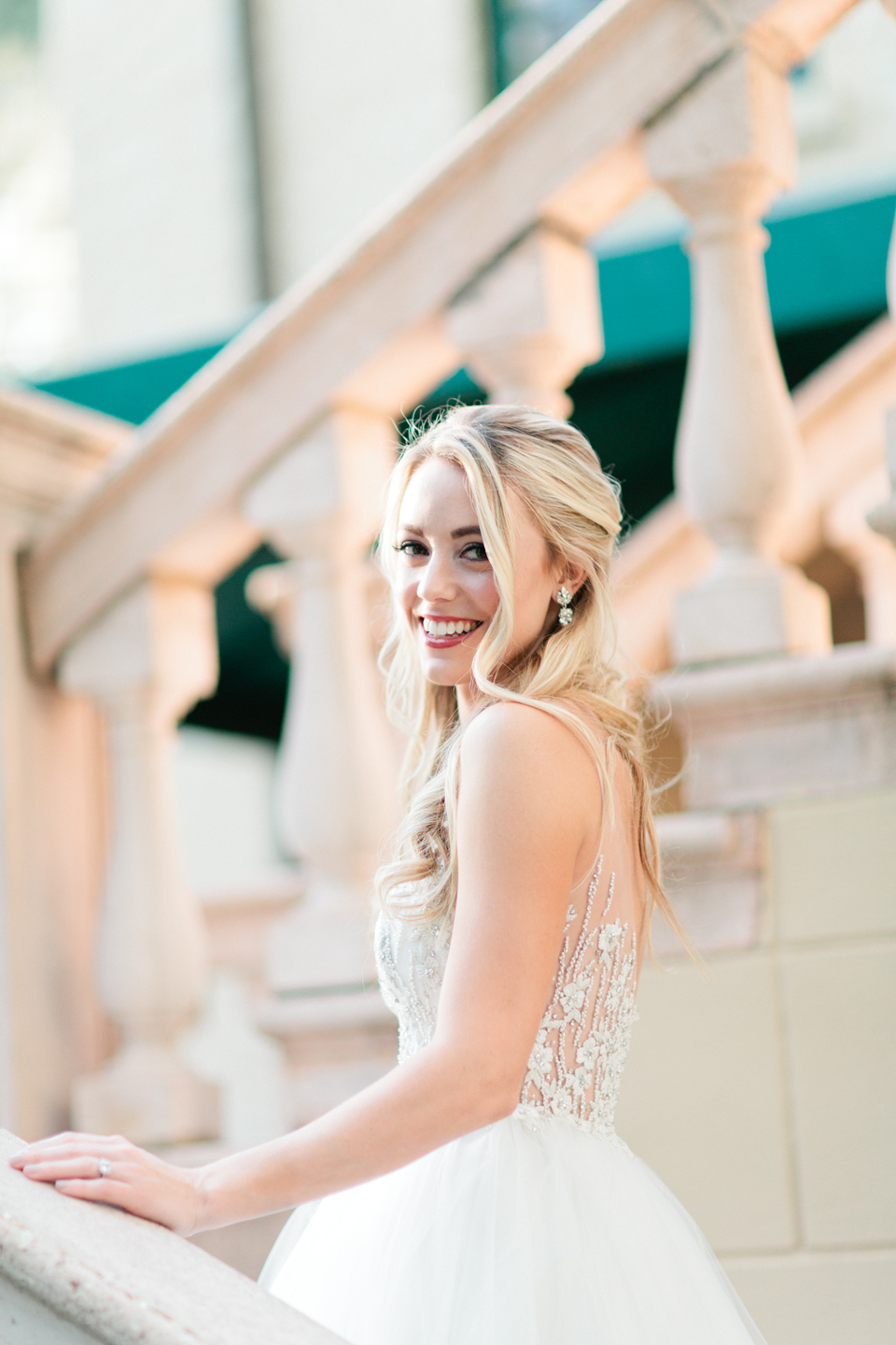 Picture of a bride in a wedding gown on a staircase at the Epping Forest Yacht Club in Jacksonville, Florida